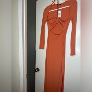 NWT- Long sleeve slit dress with halter cut out